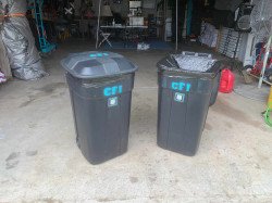 36 gallon black trash cans with lids, wheels, and two liners