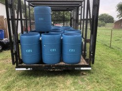 CFI20blue205520gallon20trash20cans20in20trailer 1710912838 55 gallon blue drum trash cans with handles and two liners